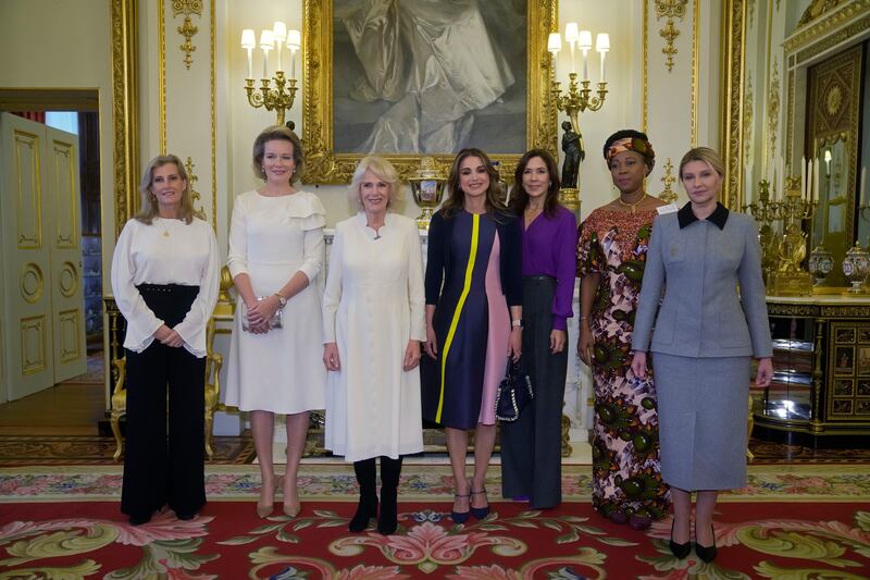 From left, Britain's Sophie, the Countess of Wessex; Queen Mathilde of Belgium; Camilla, Queen Consort; Queen Rania of Jordan; Mary, Crown Princess of Denmark;  Fatima Maada Bio, the first lady of Sierra Leone; and Olena Zelenska, the first lady of Ukraine, at a reception in Buckingham Palace to raise awareness about violence against women and girls as part of the UN's Sixteen Days of Activism Against Gender-Based Violence campaign. AP