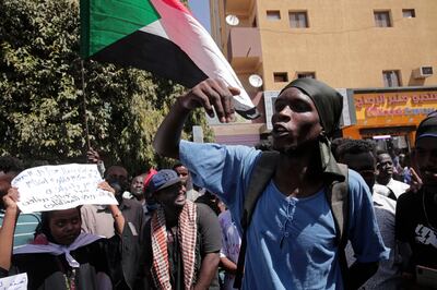 Demonstrators protest against Sudan's October 25 military coup in Khartoum on February 14, 2022.  AP