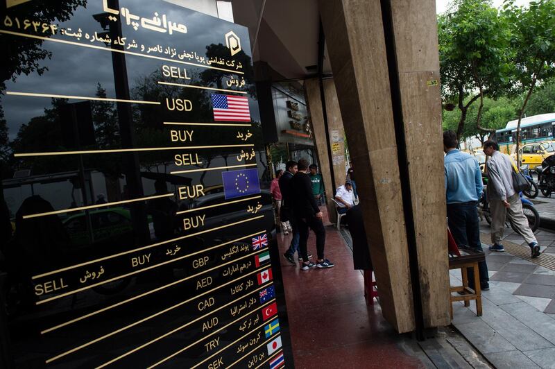 A closed currency exchange bureau rates board displays no rates in Tehran, Iran, on Wednesday, May 9, 2018. U.S. President Donald Trump pulled out of the 2015 deal that put limits on Iran’s nuclear program in exchange for rapprochement with the West. Photographer: Ali Mohammadi/Bloomberg