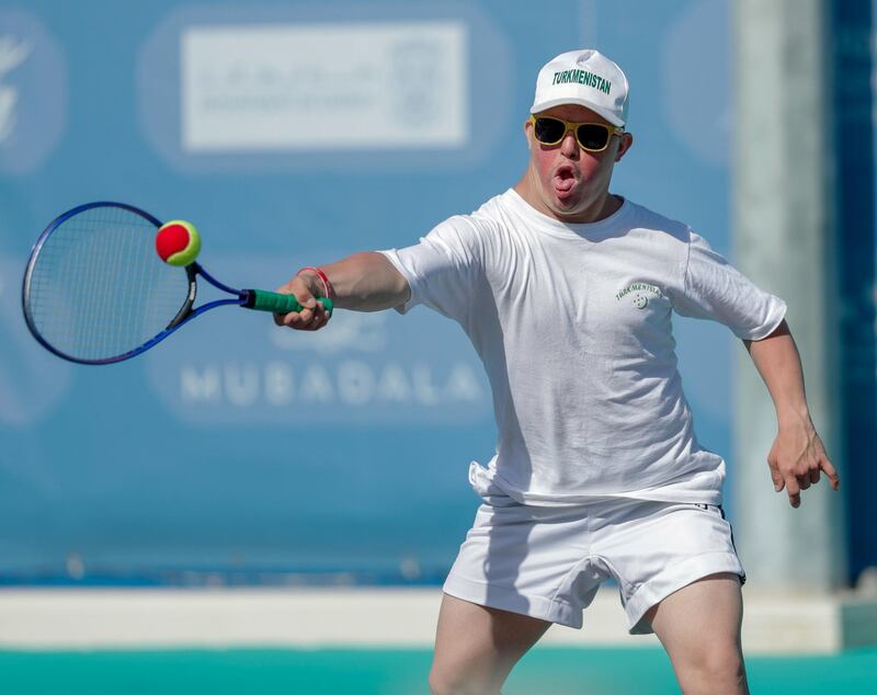 Abu Dhabi, March 19, 2019.  Special Olympics World Games Abu Dhabi 2019.  Tennis at the Zayed Sports City.  Roman Ovarov of Turkmenistan returns the ball in his doubles match against Romania.
Victor Besa/The National