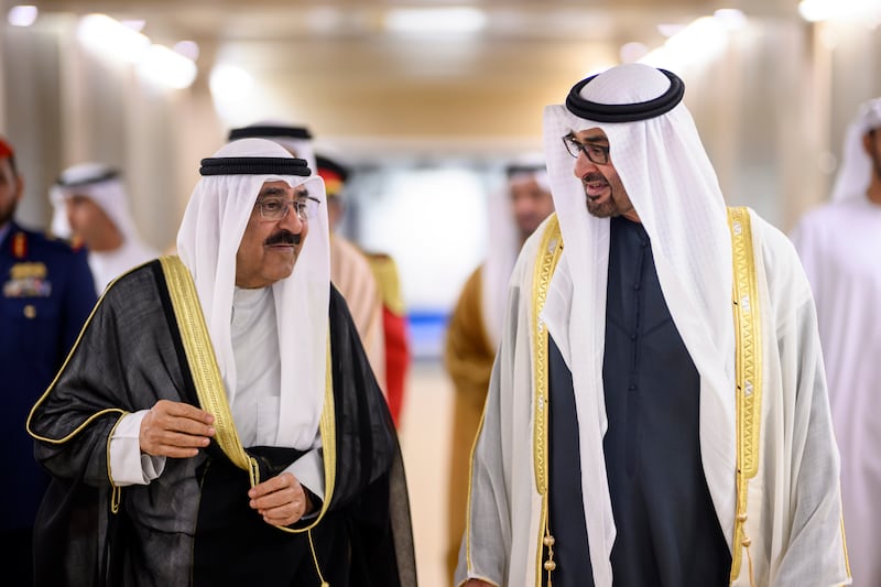 President Sheikh Mohamed receives Kuwaiti Emir Sheikh Meshal upon his arrival in Abu Dhabi on a state visit. Hamad Al Kaabi / UAE Presidential Court
