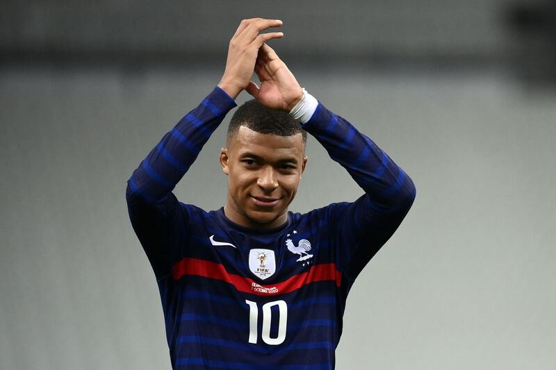 Kylian Mbappe celebrates at the end of the friendly against Ukraine. AFP