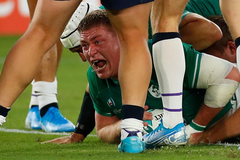 Ireland's prop Tadhg Furlong reacts after scoring a try during the Japan 2019 Rugby World Cup Pool A match between Ireland and Scotland at the International Stadium Yokohama in Yokohama on September 22, 2019.  / AFP / Odd ANDERSEN

