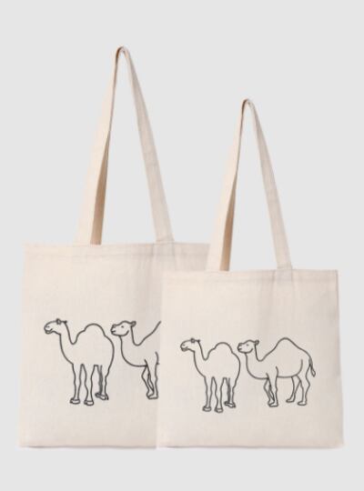 Canvas shopping bags with a camel design. Photo: Noon