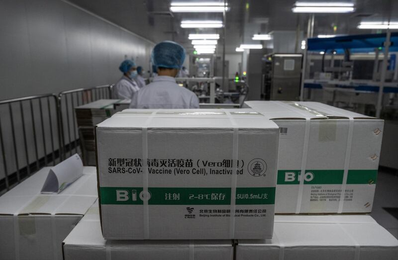 Boxes of Sinopharm's Covid-19 vaccine in the packaging area. The company says it is able to produce up to one billion doses this year. Getty