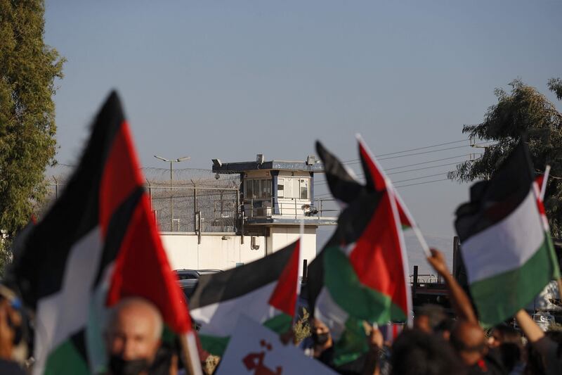 Palestinians protest outside Gilboa prison. The six escapees have been celebrated as heroes by Palestinians, who have praised their audacious plot to tunnel their way out of a cell.