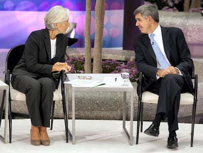 Christine Lagarde, managing director of the International Monetary Fund (IMF), left, speaks with Mohamed El-Erian, chief executive officer of Pacific Investment Management Co. (PIMCO), before the start of a panel discussion during the annual fall meetings of the IMF and World Bank in Washington, D.C., U.S., on Thursday, Sept. 22, 2011. The world is on the eve of the next financial crisis, with sovereign debt its epicenter, said El-Erian. Photographer: Joshua Roberts/Bloomberg via Getty Images 