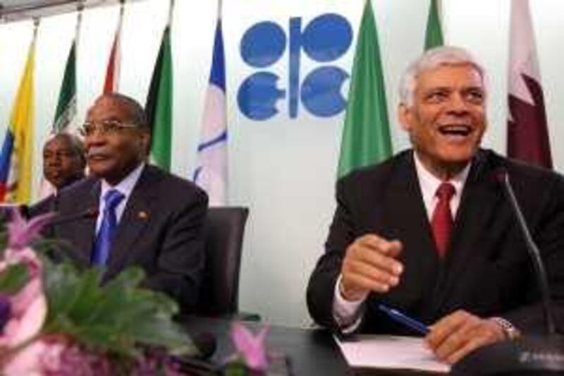 Jose Maria Botelho de Vasconcelos, Angola's oil minister and OPEC president, left, and Abdalla El-Badri, OPEC secretary-general, arrive for a news conference following the 153rd Organization of Petroleum Exporting Countries (OPEC) meeting in Vienna, Austria, on Thursday, May 28, 2009. OPEC decided to keep production quotas unchanged at today's meeting in Vienna, banking on a recovery in oil demand toward the end of the year. Photographer: Adam Berry/Bloomberg News *** Local Caption ***  533330.jpg