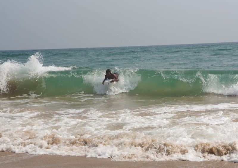 A boy swimming in the Bay of Bengal sea in Odisha in eastern India.