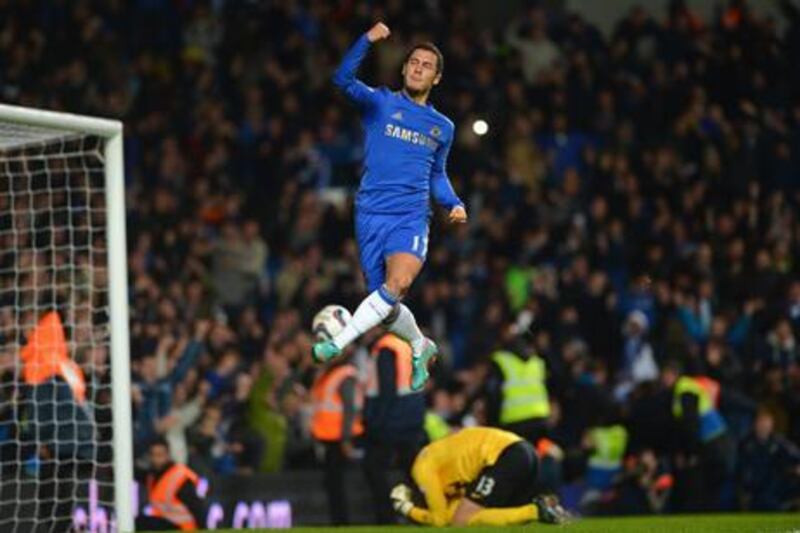 Eden Hazard celebrates scoring his penalty against Manchester United in the Capital One Cup