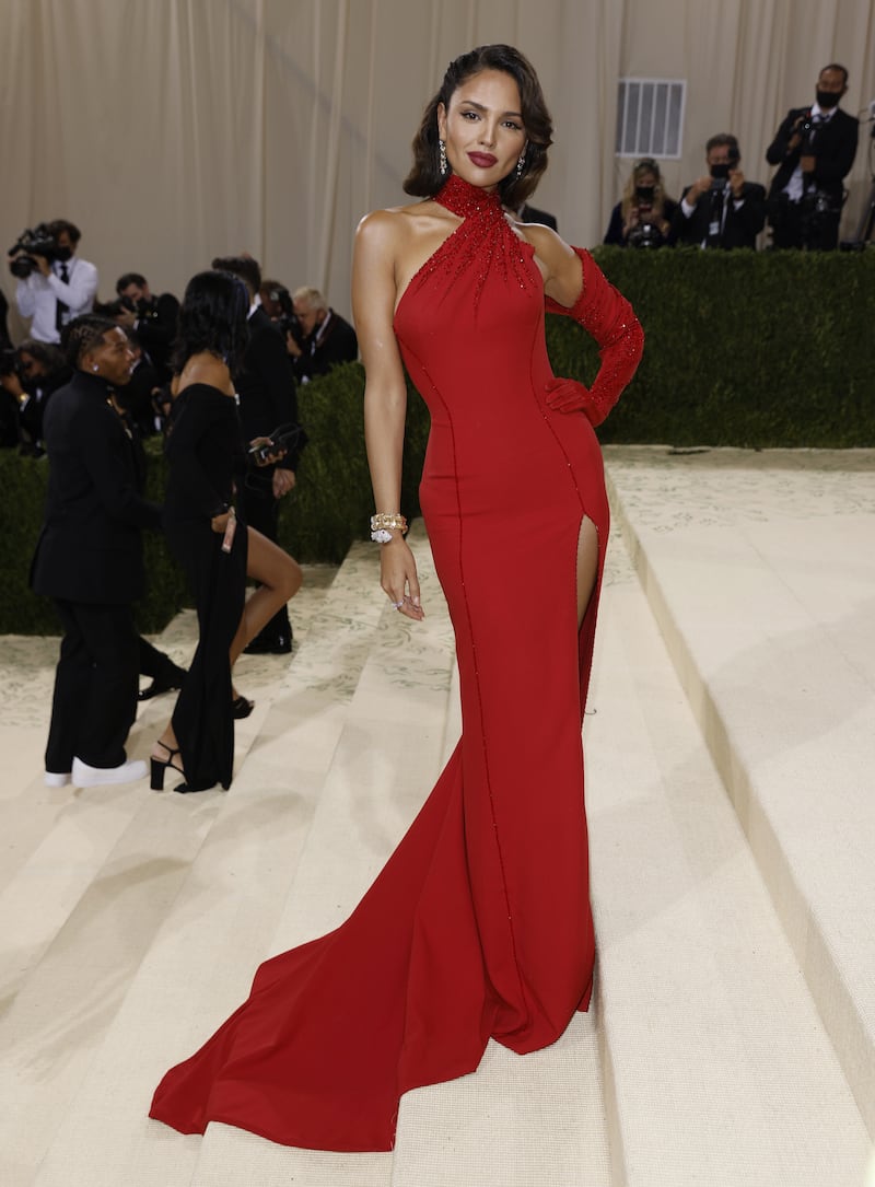 Eiza Gonzalez wears red Atelier Versace to the 2021 Met Gala. EPA