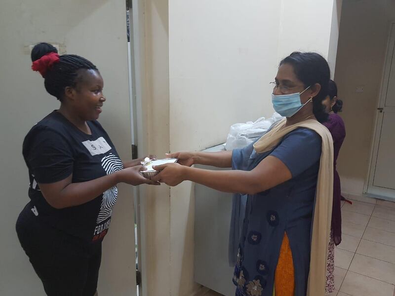 A delivery of hot food is made by a Meals of Grace volunteer in Dubai. Courtesy: Courtesy: St Mary's Catholic Church