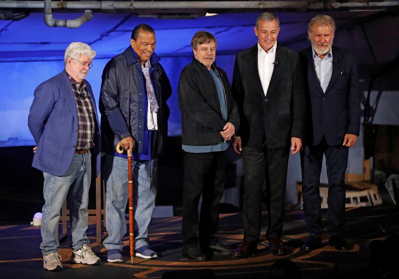 Actors Harrison Ford, Mark Hamill, Billy Dee Williams, filmmaker George Lucas and Walt Disney's Chief Executive Officer Bob Iger at Star Wars: Galaxy's Edge at Disneyland Park in Anaheim, California. Reuters