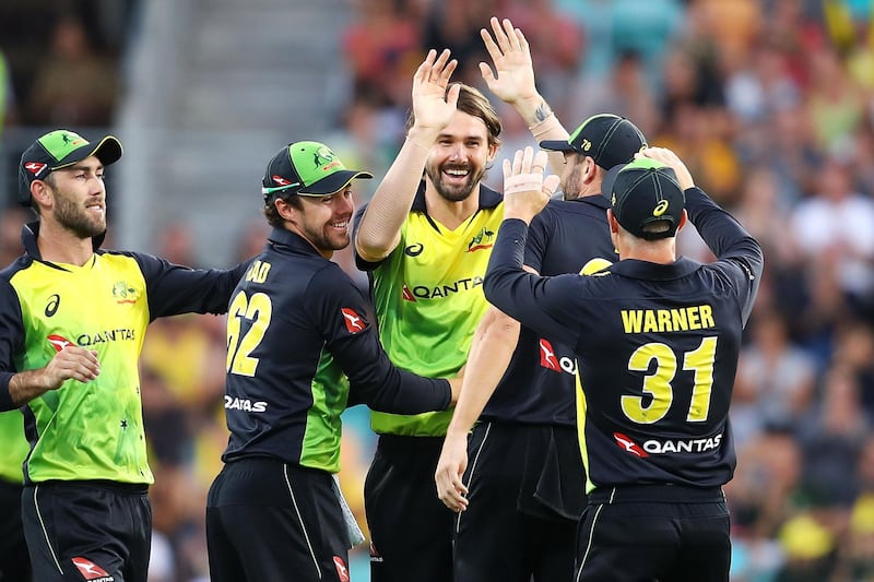 HOBART, AUSTRALIA - FEBRUARY 07:  Kane Richardson of Australia celebrates with his team after taking the wicket of Jason Roy of England during the Twenty20 International match between Australia and England at Blundstone Arena on February 7, 2018 in Hobart, Australia.  (Photo by Mark Kolbe/Getty Images)