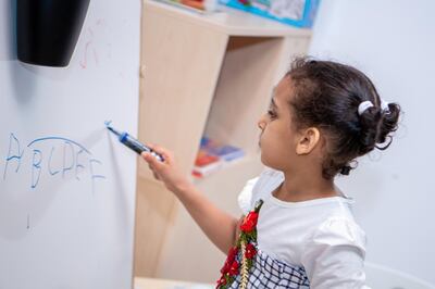 A child practises her drawing in the Quiet Room in Yas Mall Abu Dhabi. Courtesy Zayed Higher Organisation for People of Determination