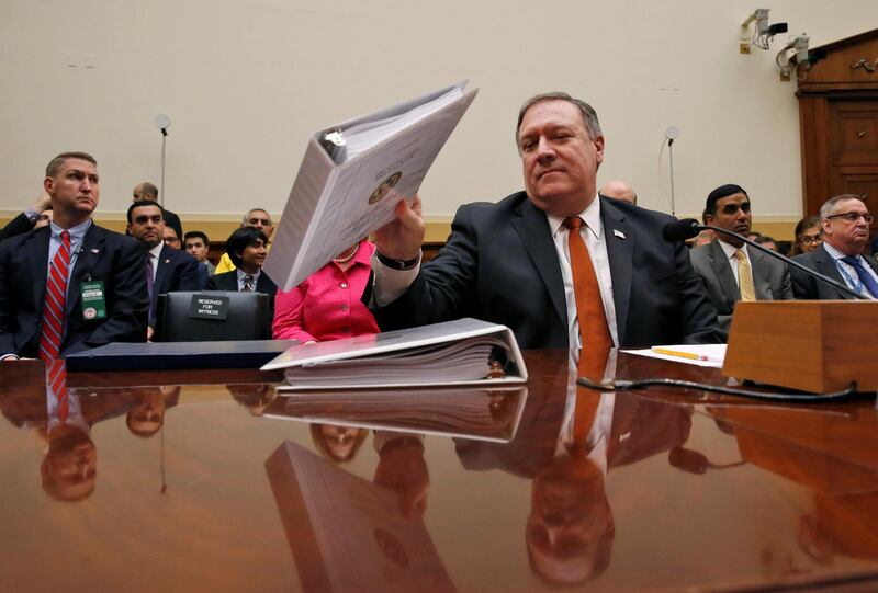 U.S. Secretary of State Mike Pompeo prepares to testify at a hearing of the U.S. House Foreign Affairs Committee on Capitol Hill in Washington, U.S., May 23, 2018. REUTERS/Leah Millis