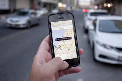 The Uber app on a smartphone. Antonie Robertson / The National