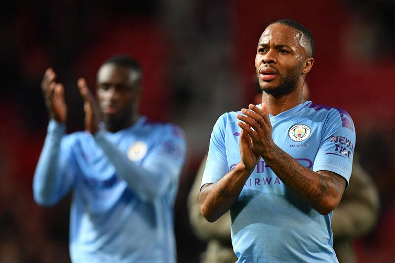 Raheem Sterling applauds the fans following the win at Old Trafford. AFP