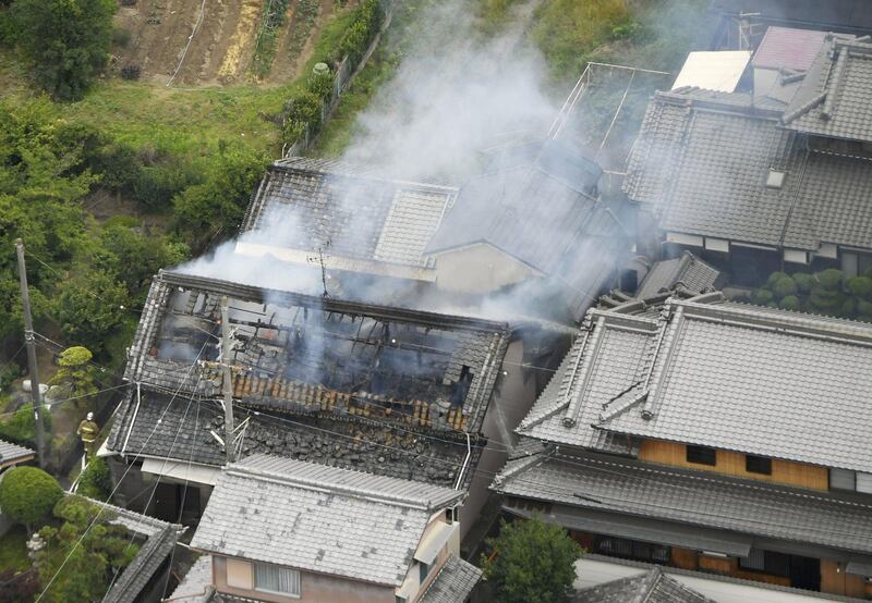 Smoke arise from a house where a fire breaks out, in Takatsuki, Osaka. Reuters