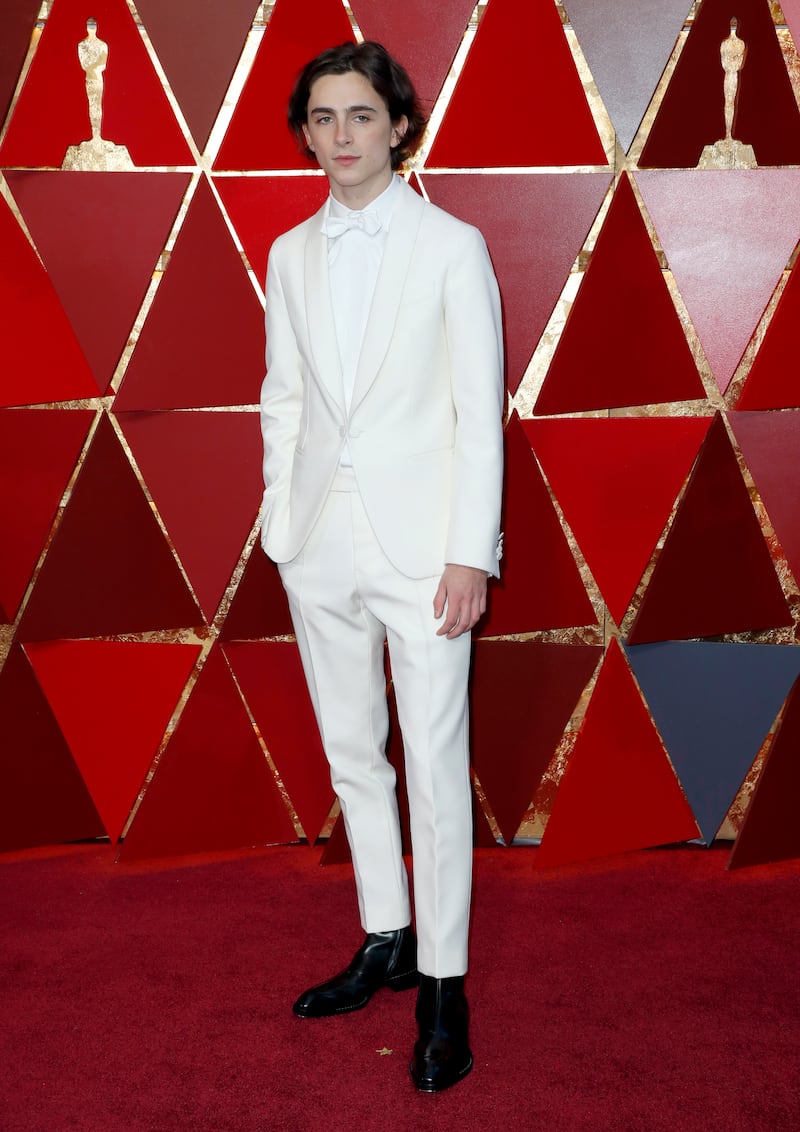 Timothee Chalamet in all-white Berluti for the 90th annual Academy Awards in March 2018. EPA