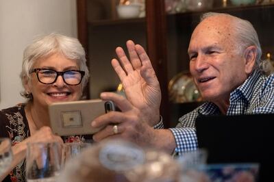 Janis and Uri Segal celebrate Thanksgiving with a virtual zoom with their family before a small dinner together, as they try to prevent the spread of coronavirus disease (COVID-19), in Detroit, Michigan, U.S. November 26, 2020.  REUTERS/Emily Elconin