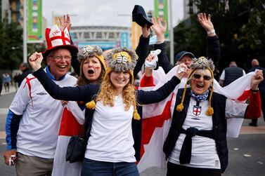 England supporters arrive at Wembley Stadium in west London on June 22, 2021, to watch the UEFA EURO 2020 football match between England and Czech Republic. AFP