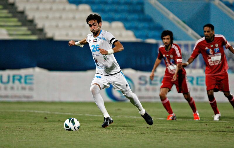 DUBAI, UNITED ARAB EMIRATES - October 9, 2012- Baniyas's Yousef Jaber kicks the tying goal during first half football action against Al Jazira in Baniyas Stadium in Baniyas, Abu Dhabi October, 9, 2012. (Photo by Jeff Topping/The National)