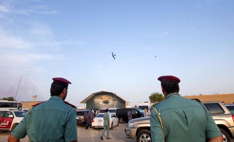 FUJAIRAH, UNITED ARAB EMIRATES - Police officers controlling traffice can only watch from outside of  the Fourth Union Fortress, Fujairah.  Leslie Pableo for The National for Ruba Haza���s story