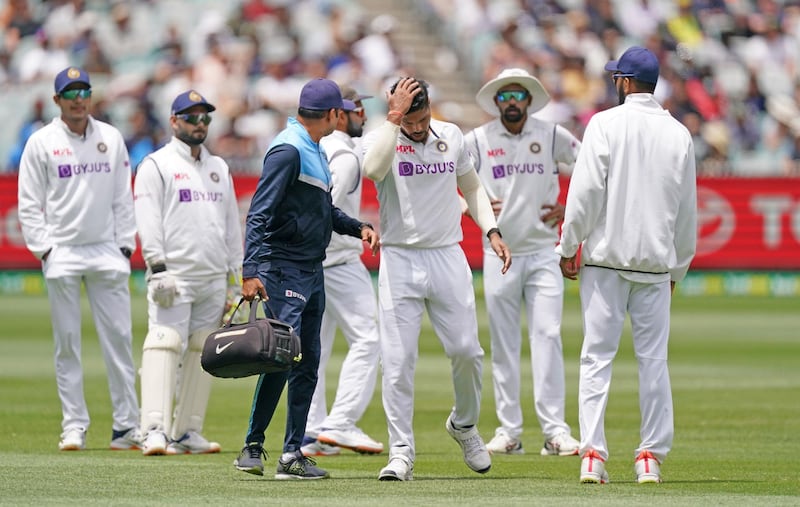 India's Umesh Yadav leaves the field injured. Reuters