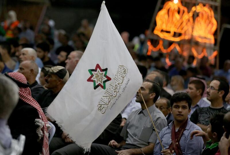 Supporters attend a campaign conference for the Jordan's National Alliance for Reform in Amman's Sweileh district. Khalil Mazraawi / AFP