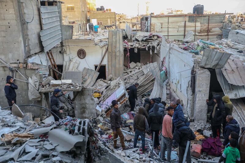 People inspect the damage to their homes following Israeli air strikes. Strikes intensified overnight as Israel reiterated intent to press on with a ground offensive in the city of Rafah, in southern Gaza. Some 1.4 million internally displaced Palestinians are sheltering there, and a growing number of countries are expressing alarm about the operation. Getty Images