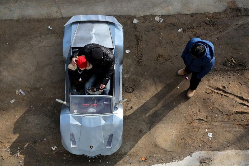 Guo spent six months and about 5,000 yuan ($821) to make the two-metre long, one metre  wide “lamborghini” as a toy for his grandson.