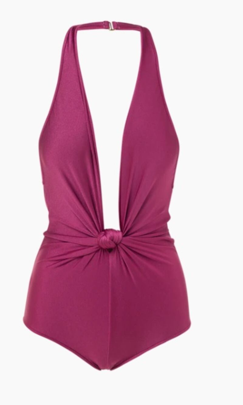 Halter neck swimsuits: evoking a 1920s style, this plum-coloured Adriana Degreas swimsuit is a classic fit with ruched knotted detail at the front; Dh875, Adriana Degreas at thatconeptstore.com. Photo: That Concept Store