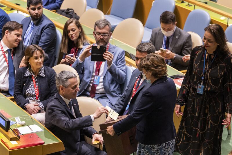 Members of the Swiss delegation cast their ballots for the election of the five countries that will take up non-permanent seats on the UN Security Council. EPA