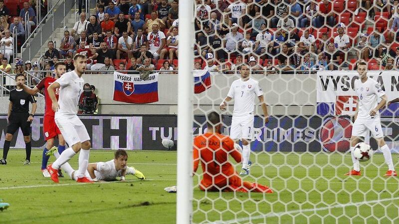 England’s Adam Lallana scores their goal against Slovakia in the European World Cup qualifying match. Carl Recine / Action Images / Reuters