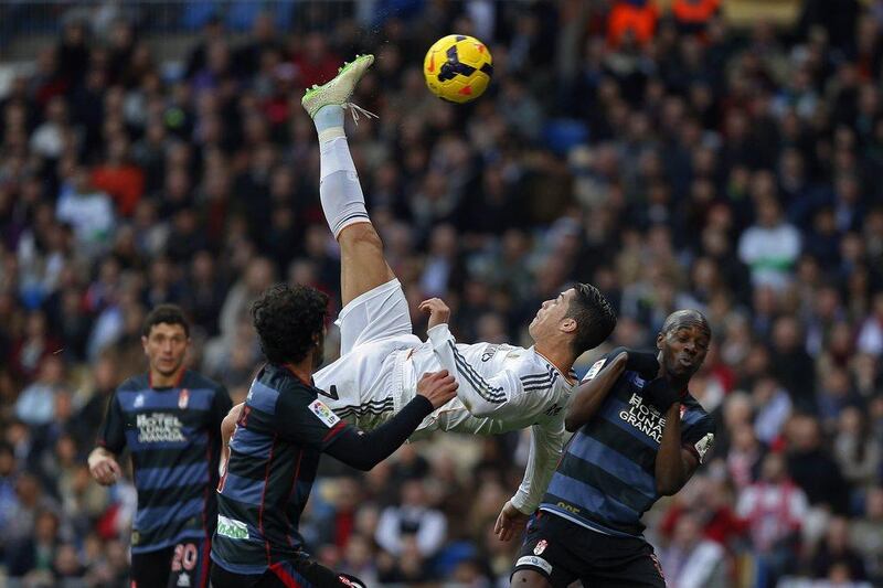Cristiano Ronaldo attempts a bicycle kick on Saturday. Andres Kudacki / AP