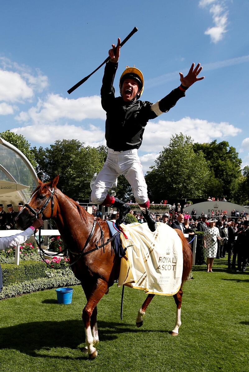 Frankie Dettori jumps off Stradivarius as he celebrates winning the 4.20 Gold Cup at Royal Asoct. Paul Childs  / Action Images via Reuters
