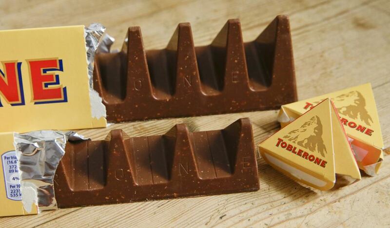 Gutted: the old Toblerone, above, and the austerity-driven new 150g bar. Alastair Grant / AP Photo