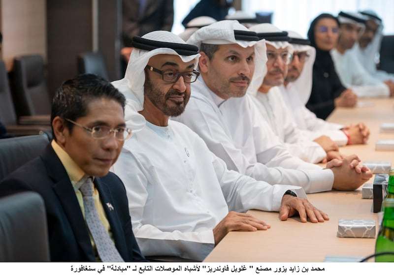 SINGAPORE, SINGAPORE - February 28, 2019: HH Sheikh Mohamed bin Zayed Al Nahyan, Crown Prince of Abu Dhabi and Deputy Supreme Commander of the UAE Armed Forces (2nd L), listens to a presentation, at Mubadala's GLOBALFOUNDRIES semiconductor facility. Seen with HE Khaldoon Khalifa Al Mubarak, CEO and Managing Director Mubadala, Chairman of the Abu Dhabi Executive Affairs Authority and Abu Dhabi Executive Council Member  (3rd L) and HE Dr Mohamed Maliki bin Osman, Senior Minister of State, Ministry of Defence & Ministry of Foreign Affairs (L).
( Ryan Carter for the Ministry of Presidential Affairs )
---
