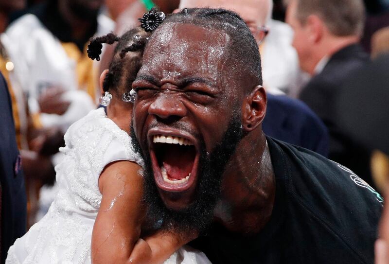 Deontay Wilder celebrates after his seventh-round knockout of Luis Ortiz in their WBC heavyweight title fight in Las Vegas on Saturday, November 23. AP