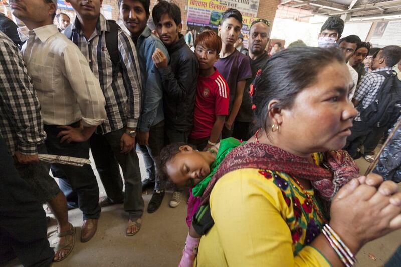 Nepalese in Kathmandu queue up for bus tickets to travel home to celebrate Dashain festival. Hemanta Shrestha / EPA