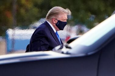 U.S. President Donald Trump arrives at Walter Reed National Military Medical Center by helicopter after the White House announced that he "will be working from the presidential offices at Walter Reed for the next few days" after testing positive for the coronavirus disease (COVID-19), in Bethesda, Maryland, U.S., October 2, 2020. REUTERS/Joshua Roberts TPX IMAGES OF THE DAY