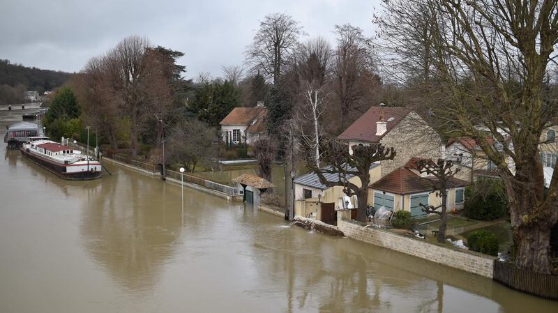 The flooded yards of houses near the Seine river in Bougival, west of Paris. Stephane De Sakutin / AFP