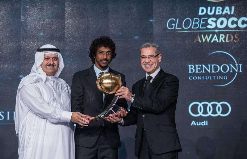 Saudi Arabia's Yasser Al Shahrani shown being awarded 'Best GCC Player of the Year' on Sunday at the Globe Soccer Awards in Dubai. AFP Photo