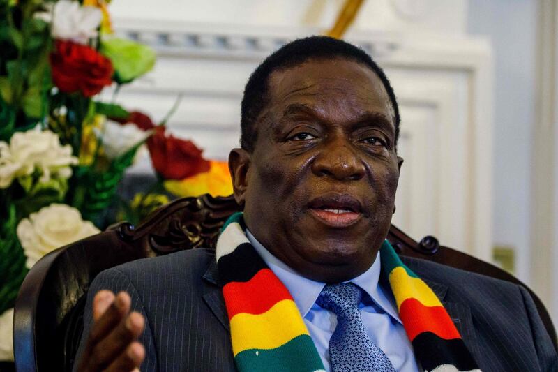 (FILES) In this file photo taken on September 7, 2018 Zimbabwe's President Emmerson Mnangagwa answers questions during a press conference to announce ministers of his new cabinet at State House in Harare, Zimbabwe. Zimbabwe President Emmerson Mnangagwa has landed back in Harare, state television said on January 22, 2019, after he cut short a foreign tour over nationwide protests that were met with a brutal security crackdown. / AFP / Jekesai NJIKIZANA
