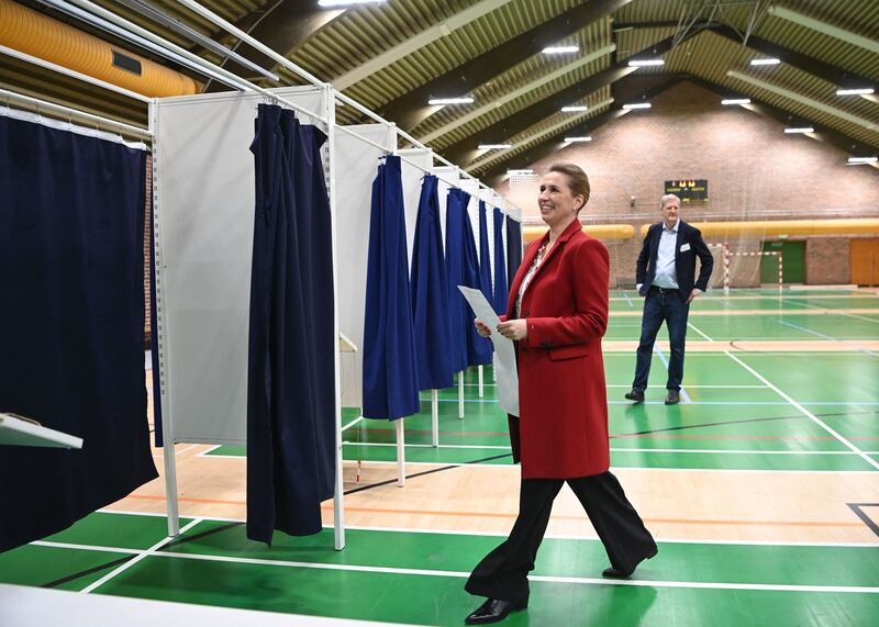 Danish Prime Minister and chairwoman of the Social Democratic Party Mette Frederiksen arrives at a polling station in Hareskovhallen, north of Copenhagen. AFP