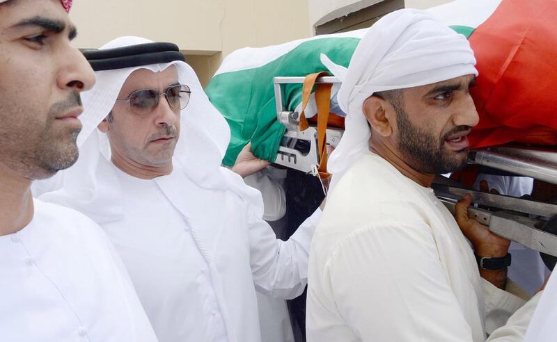 Sheikh Saif at the funeral of First Lt Al Shehi. Courtesy Security Media