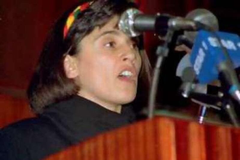 -- FILE-Jailed Kurdish politician Leyla Zana, wearing a headband with the traditional Kurdish colors yellow, green and red, takes her oath at the Turkish Parliament in this file photo of November 6, 1991. Zana was jailed to 15 years in prison on separatism charges last December and currently runs as one of the top candidates to receive this year's Nobel peace prize, worrying Turkish authorities already under the cosh from western allies for the oppression of ethnic Kurdish rights and its military campaign against Kurdish rebels.(AP Photo/Anatolia)