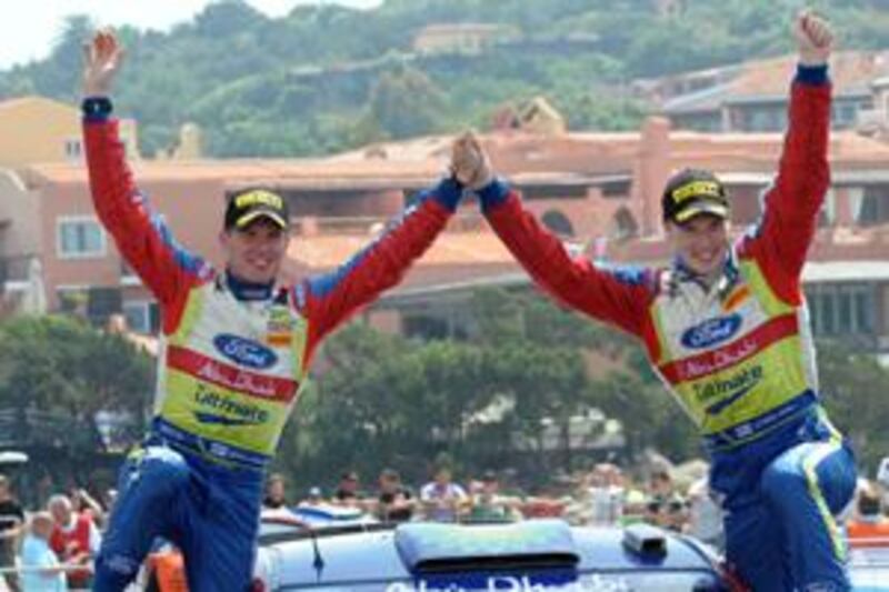 Jari-Matti Latvala right, and his co-driver Miikka Anttila celebrate their victory in Italy. The Finnish pair hope to double up in Greece this weekend.