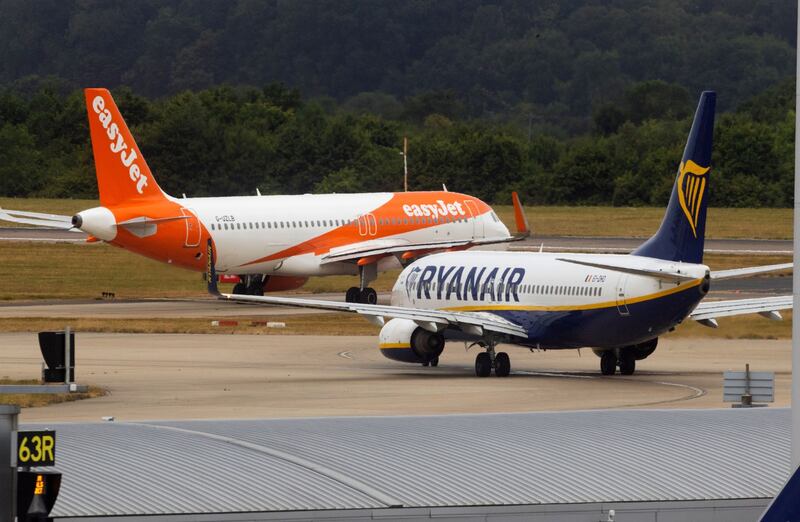 EasyJet and Ryanair passenger aircraft at London Stansted Airport. EasyJet has been hit hard by the employee crisis plaguing the European aviation industry. Chris Ratcliffe / Bloomberg
